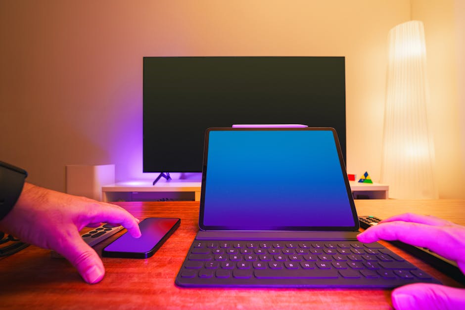 SpinVault gaming hall with modern gaming equipment and pink ambient lighting